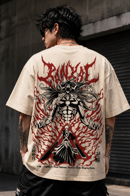 Man wearing Luri Bankai anime graphic oversized t-shirt — cream unisex dark anime streetwear tee with grunge Bankai release warrior illustration, red flame energy and Japanese kanji script, back view