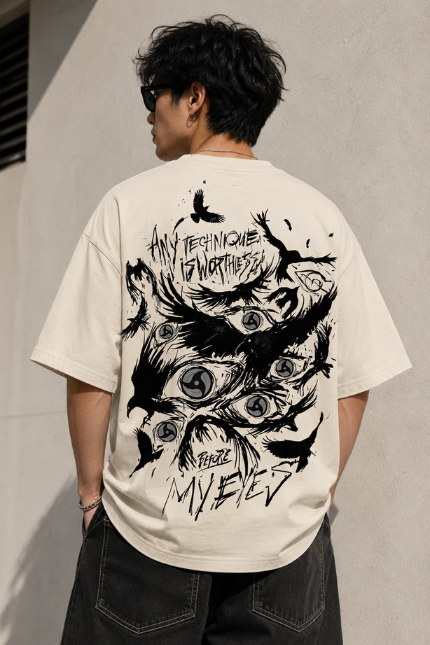 Man wearing Luri Before My Eyes anime graphic oversized t-shirt — cream unisex tee with "Before My Eyes" chest print in grunge script, front view