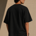 Man wearing Luri Signature Oversized Tee in black — premium unisex 260 GSM Mercerized Supima Cotton t-shirt, front view, clean minimal boxy oversized fit