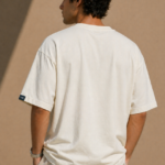 Man wearing Luri Signature Oversized Tee in black — premium unisex 260 GSM Mercerized Supima Cotton t-shirt, front view, clean minimal boxy oversized fit
