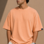 Man wearing Luri Signature Oversized Tee in black — premium unisex 260 GSM Mercerized Supima Cotton t-shirt, front view, clean minimal boxy oversized fit